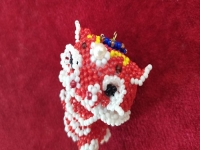 7月25日，在家可以做的工作，拿回家做的手工項目，做手工傳承官，與手工之家合作，因為看好這里、相信這里，圖為串珠米珠繡純手工產(chǎn)品剪影